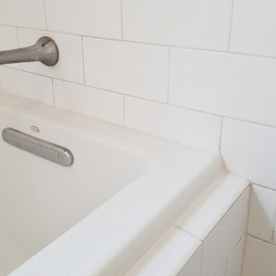 After bathtub wall joint re-caulking in Brampton.
