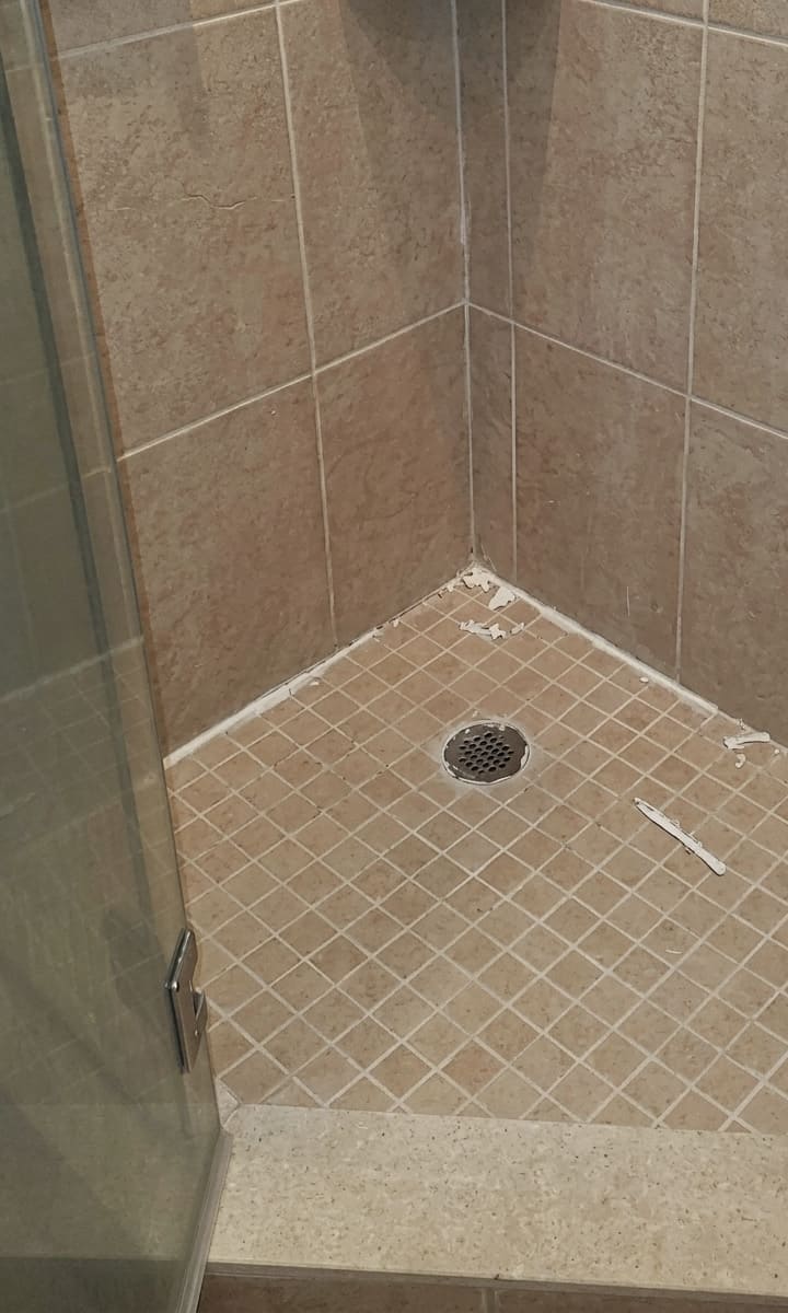 Before shower floor joint replacement in Brampton.