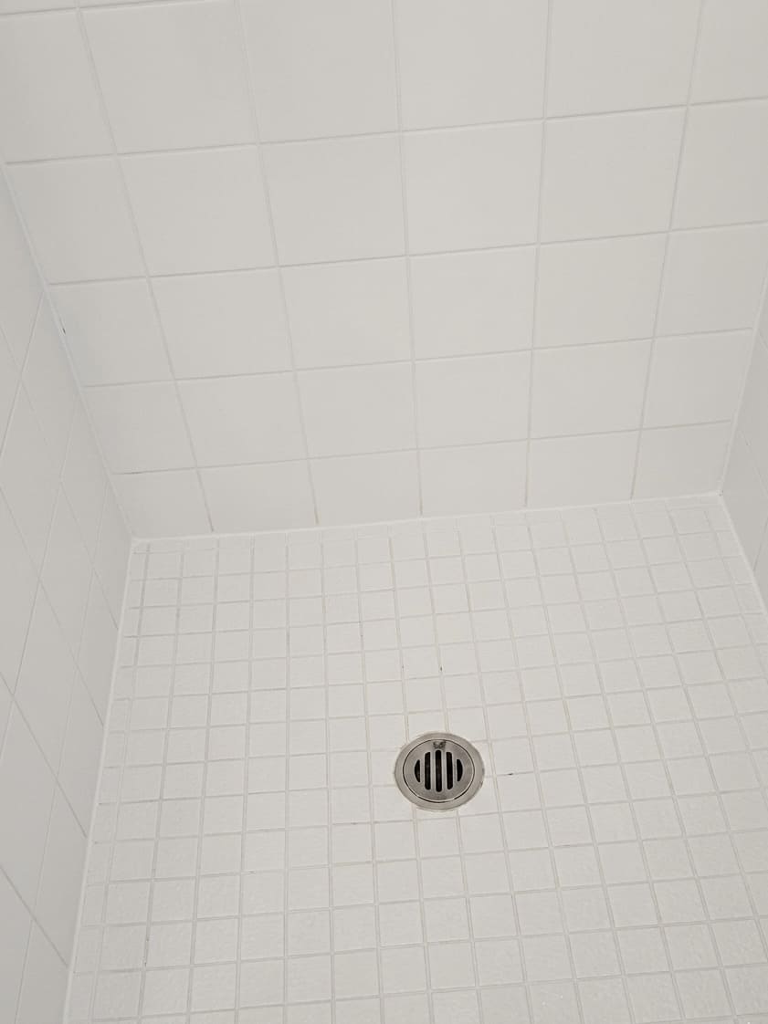 After shower corner silicone replacement in Toronto.
